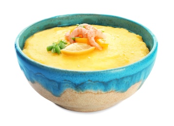 Photo of Bowl with tasty shrimps and grits on white background