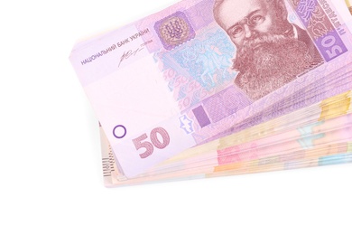 Photo of Ukrainian money on white background, top view