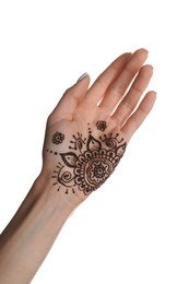 Woman with henna tattoo on palm against white background, closeup. Traditional mehndi ornament