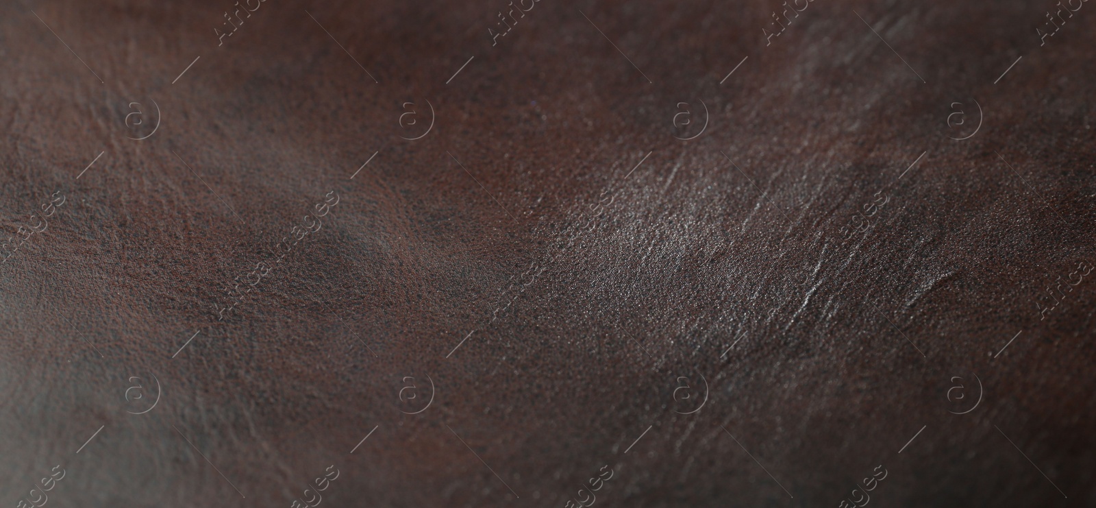 Photo of Texture of brown leather as background, closeup