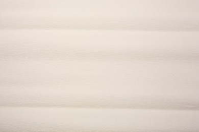 Photo of Texture of beige paper as background, closeup view