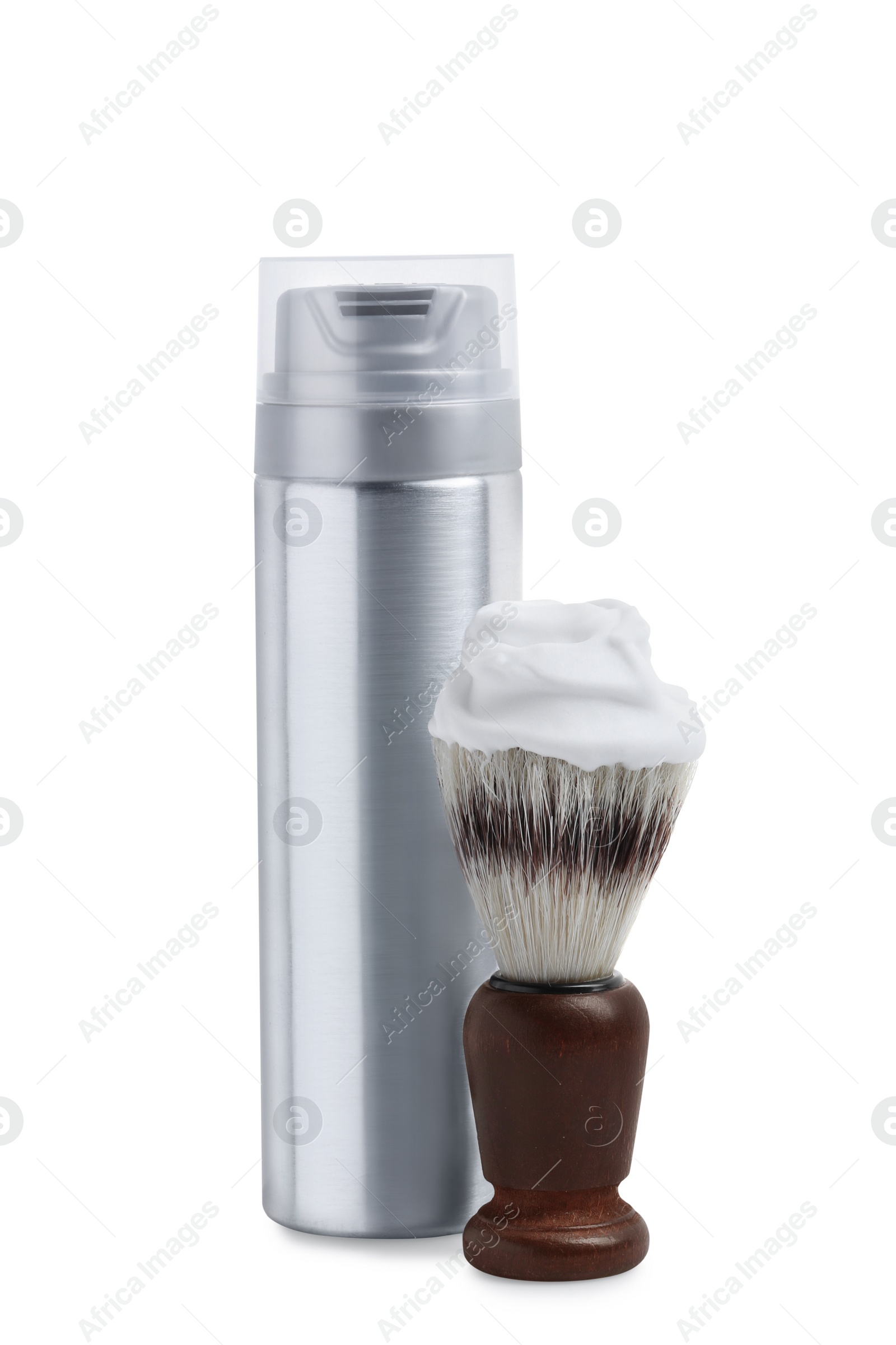 Photo of Bottle with shaving foam and brush on white background