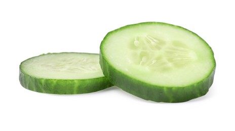 Photo of Slices of fresh cucumber isolated on white