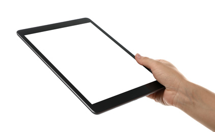 Photo of Woman holding tablet computer with blank screen on white background, closeup. Modern gadget