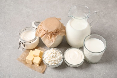 Different delicious dairy products on light table