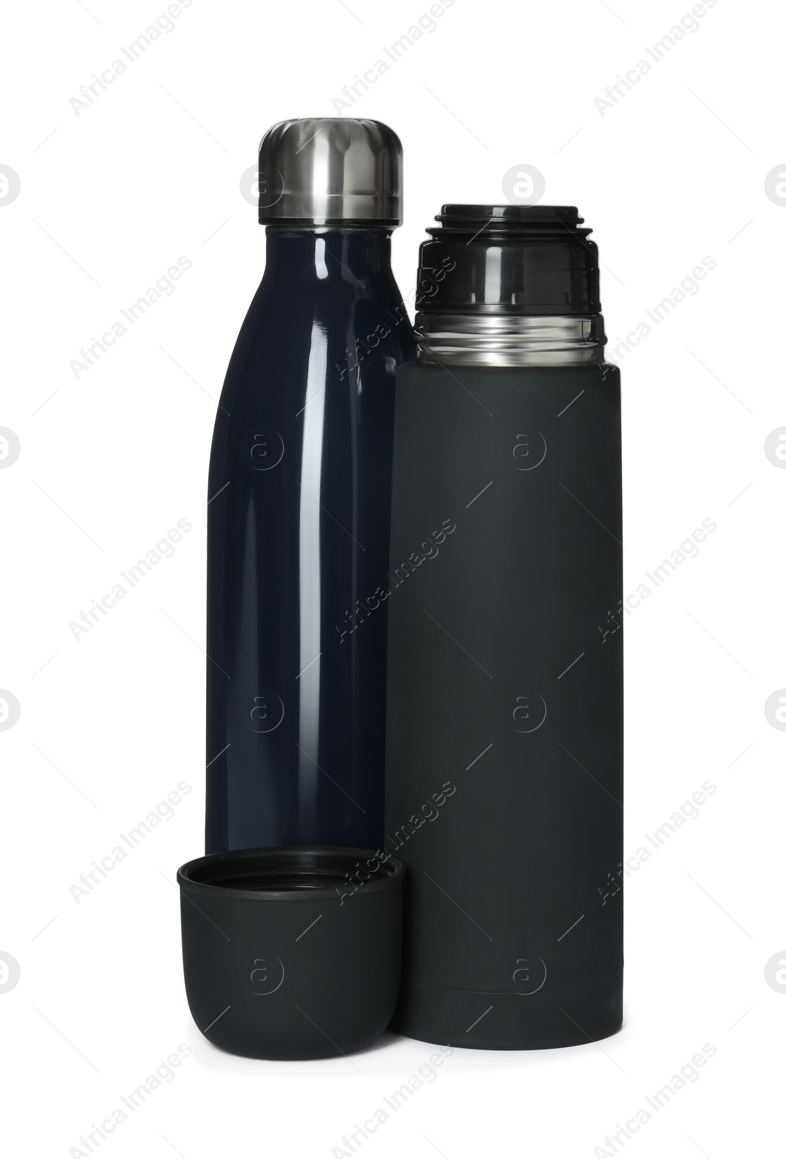 Photo of Modern thermos and bottle on white background