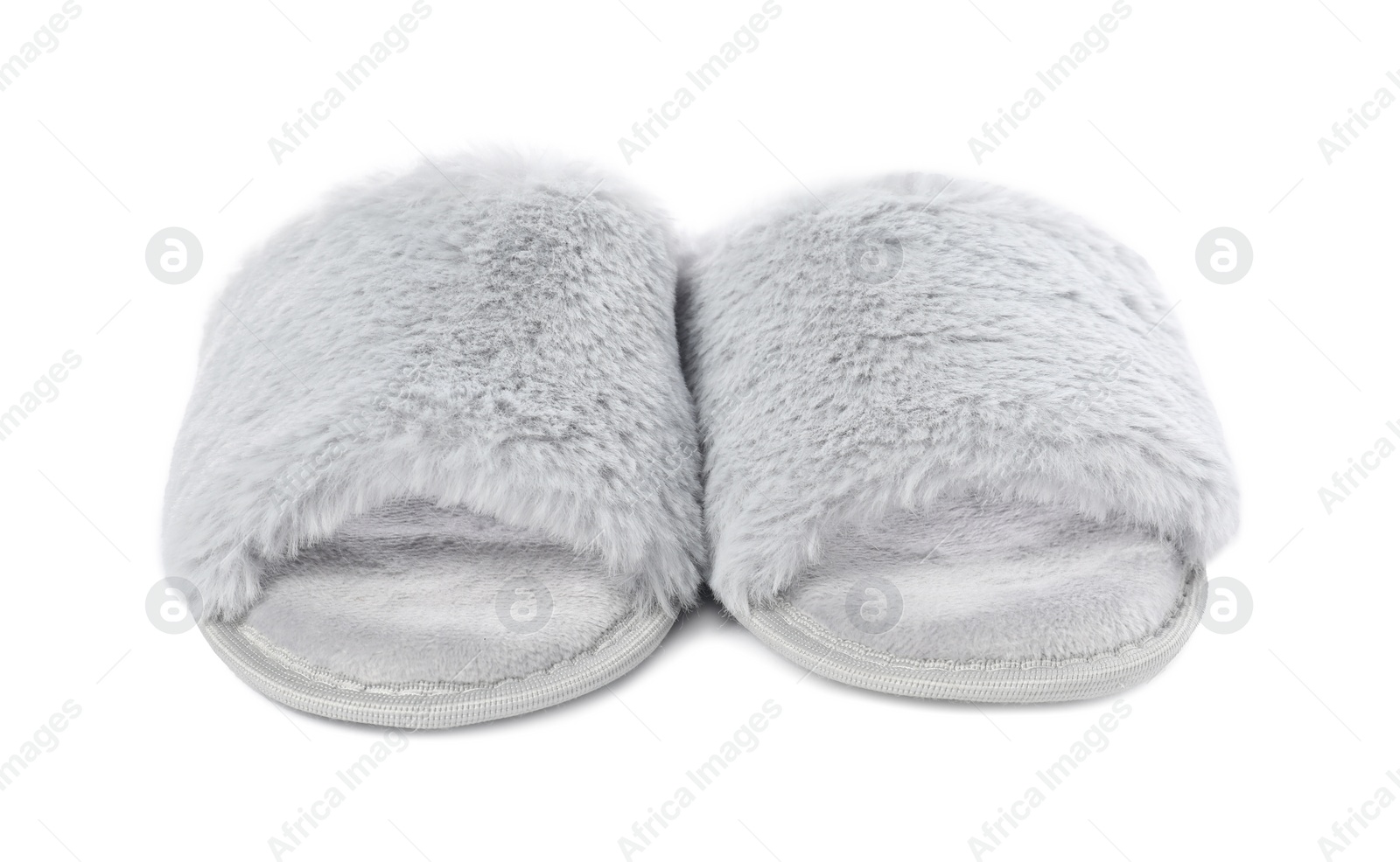 Photo of Pair of soft slippers with fur isolated on white