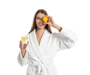 Photo of Young woman with glass of lemon water on white background