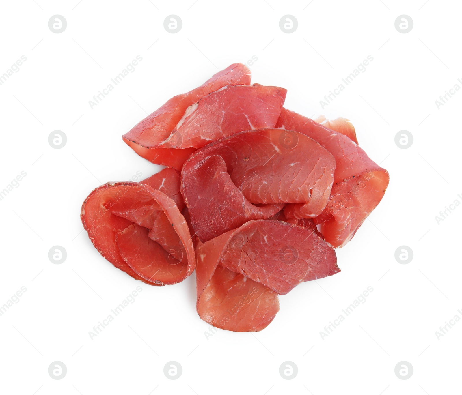 Photo of Slices of tasty bresaola isolated on white, top view