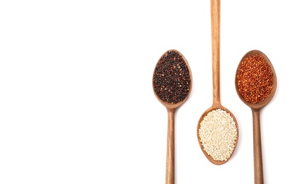 Spoons with different types of quinoa and space for text on white background, top view