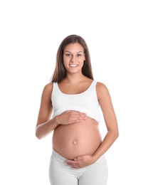 Photo of Happy pregnant woman posing on white background