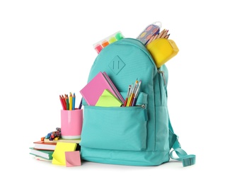 Photo of Turquoise backpack with different school stationery on white background