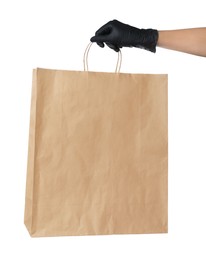 Woman holding shopping paper bag on white background