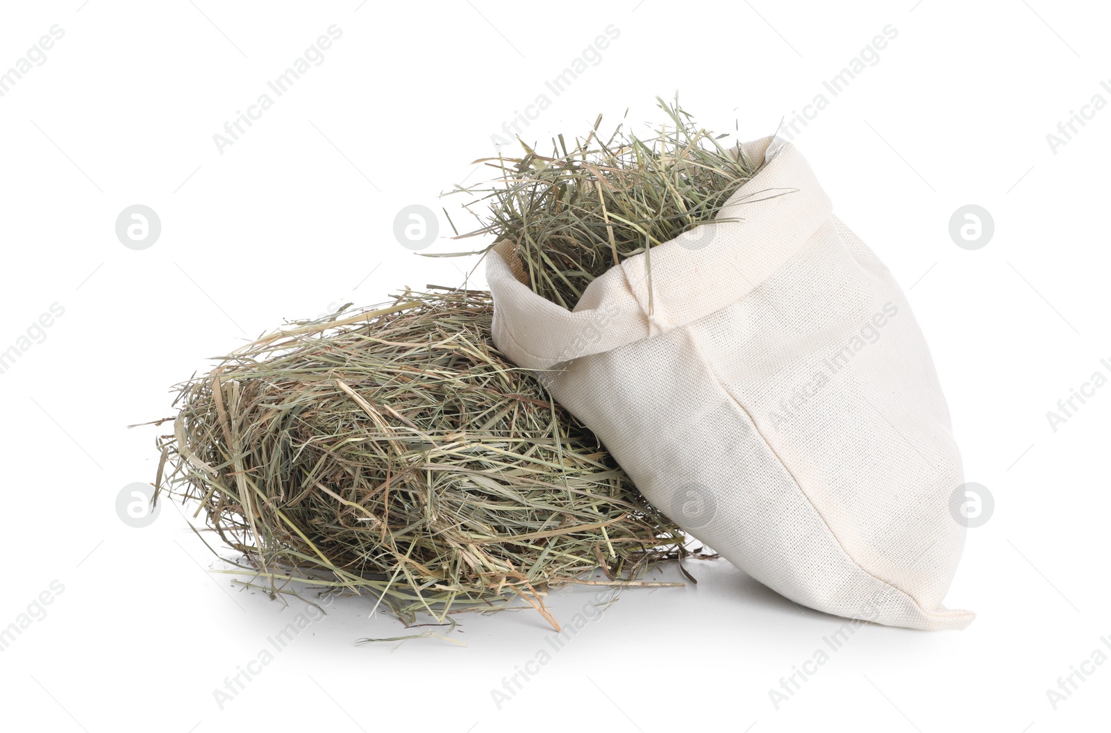 Photo of Dried hay in burlap sack isolated on white