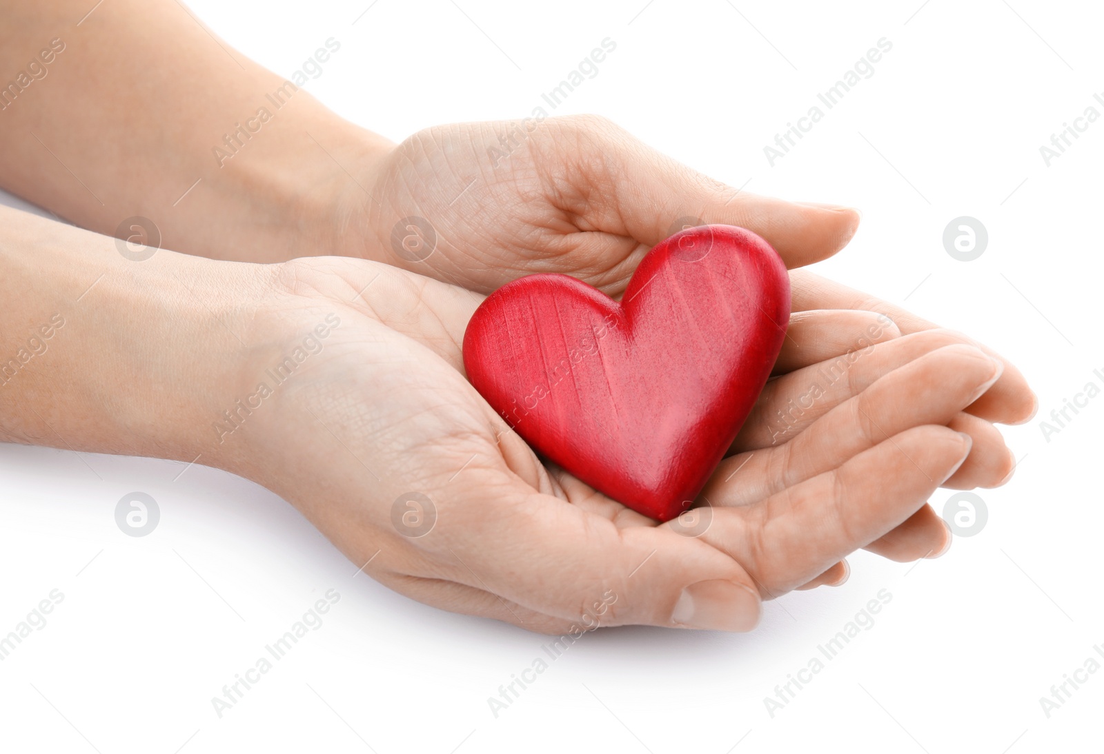 Photo of Woman holding red heart on white background, closeup. Cardiology concept