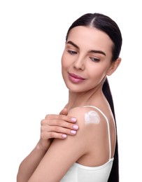 Photo of Beautiful woman with smear of body cream on her shoulder against white background