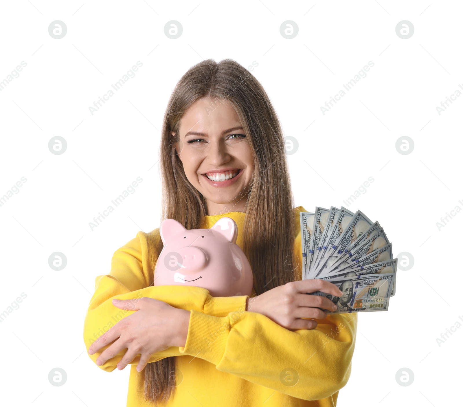 Photo of Portrait of happy young woman with money and piggy bank on white background