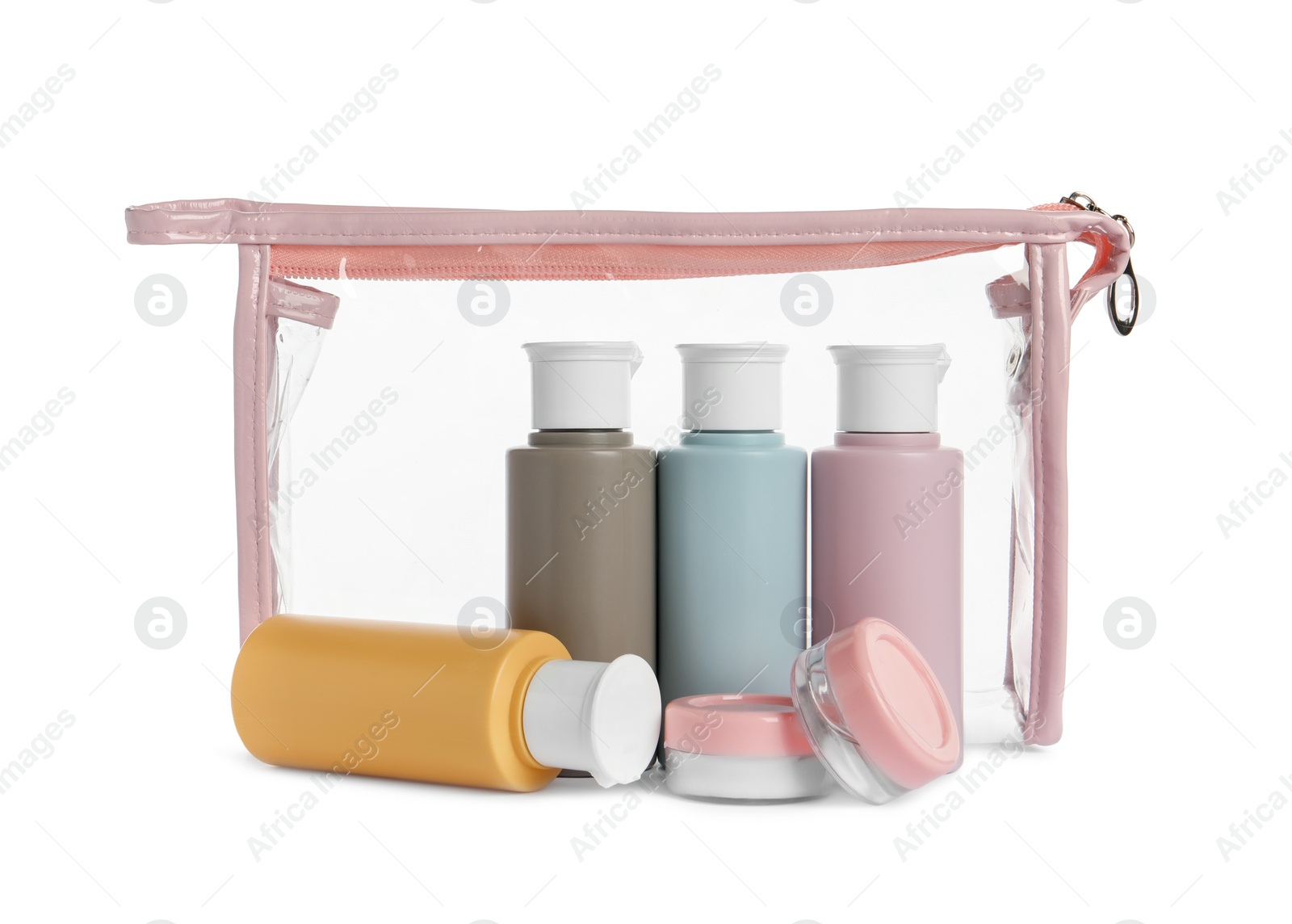 Photo of Cosmetic travel kit with plastic bag isolated on white