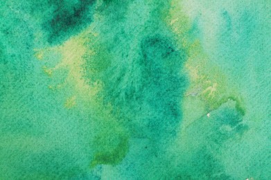 Photo of Abstract green watercolor painting as background, top view