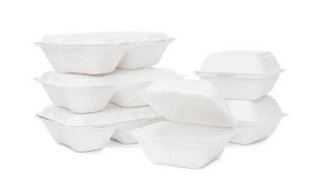 Set of different containers for food on white background