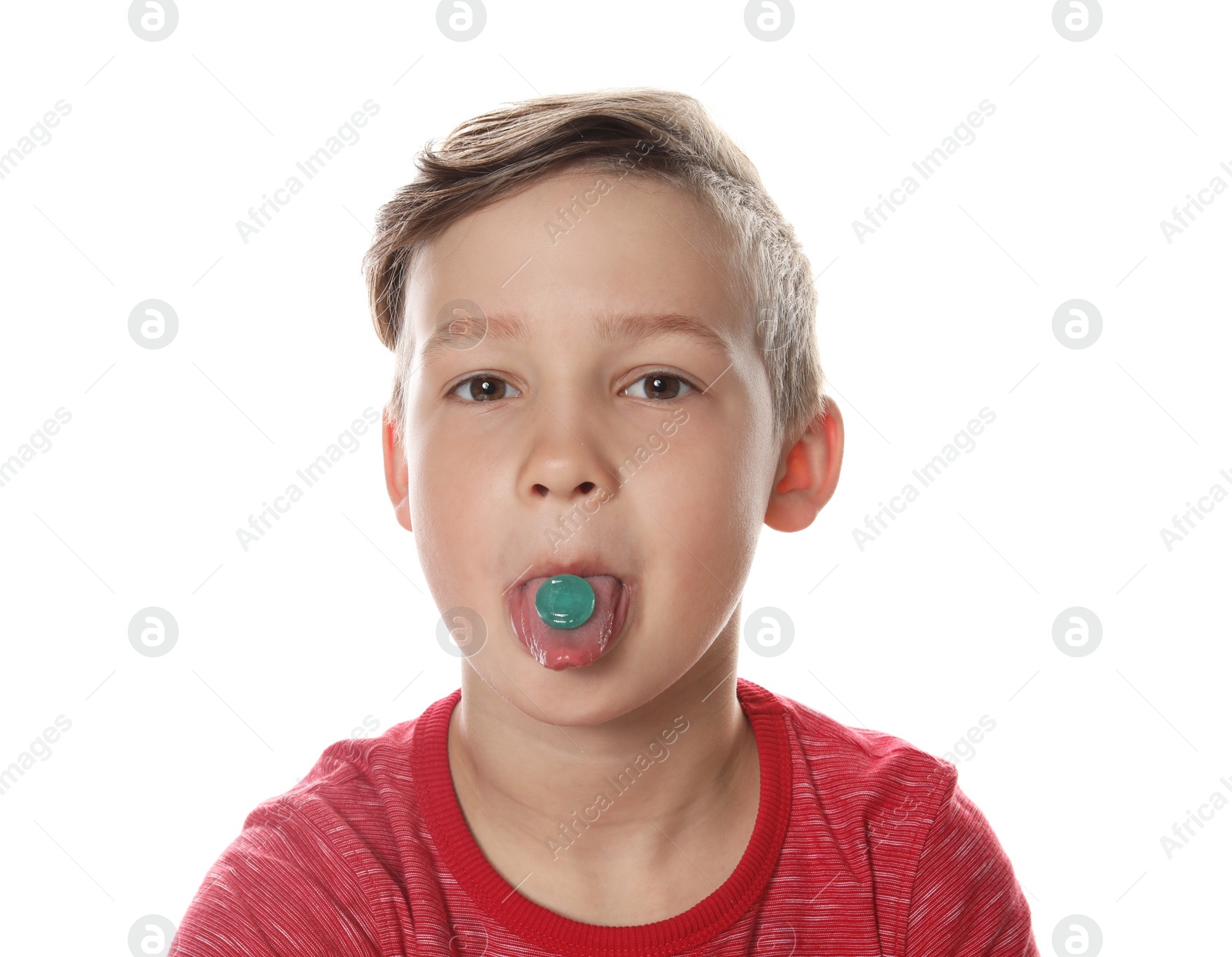 Photo of Little child taking pill on white background. Danger of medicament intoxication