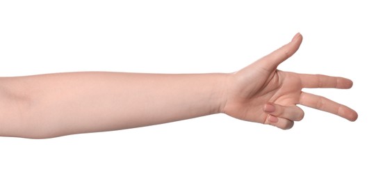 Playing rock, paper and scissors. Woman making scissors with her fingers on white background, closeup