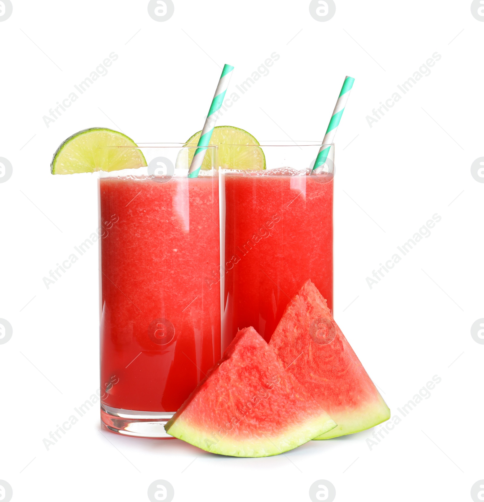 Photo of Tasty summer watermelon drink in glasses and slices of fresh fruit on white background