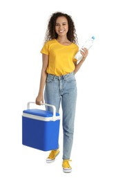 Photo of Happy young African American woman with cool box and bottle of water on white background