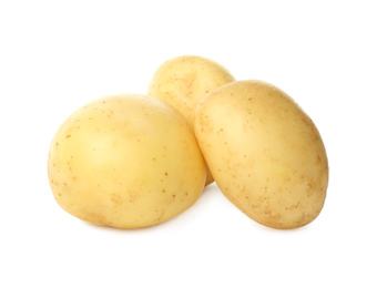 Photo of Fresh raw organic potatoes on white background