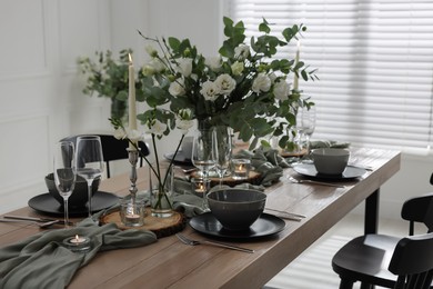 Festive table setting with beautiful tableware and decor indoors