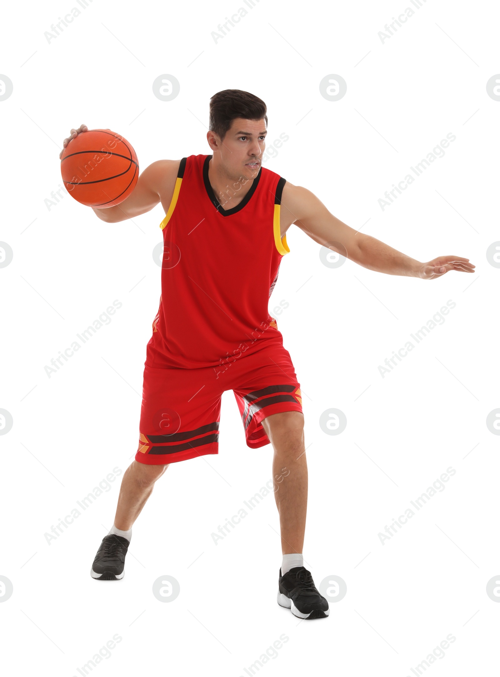 Photo of Basketball player with ball on white background