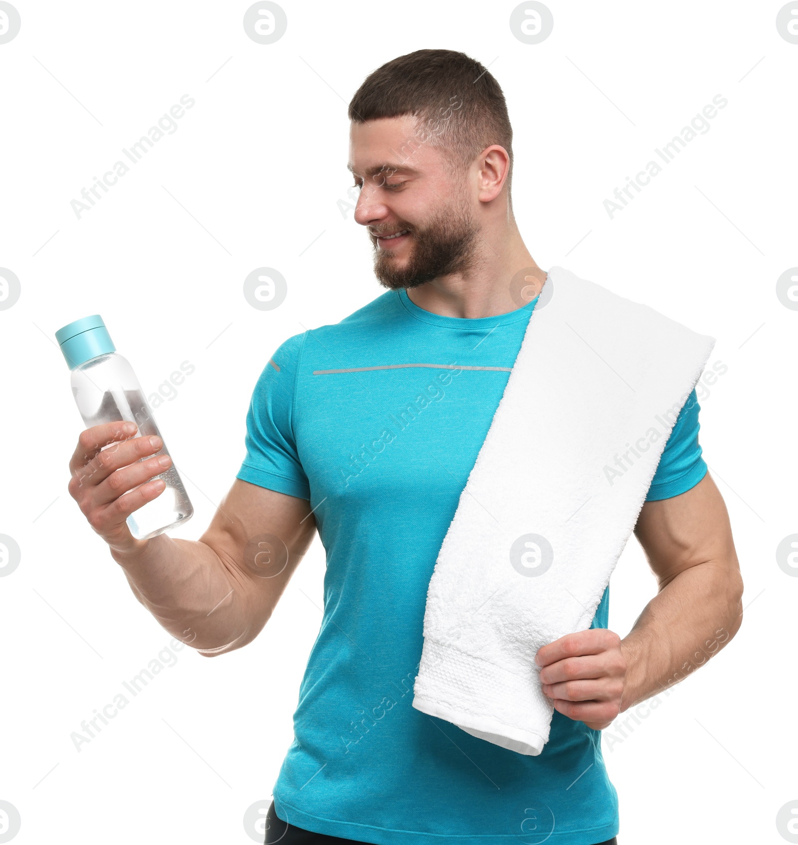 Photo of Handsome man with bottle of water and towel on white background