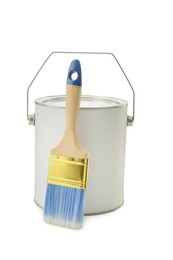 Photo of Closed blank can of paint and brush isolated on white