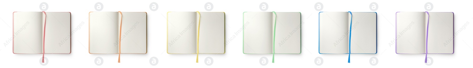 Image of Set with different open notebooks with blank sheets on white background, top view. Banner design