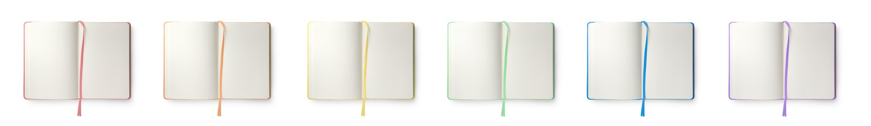 Image of Set with different open notebooks with blank sheets on white background, top view. Banner design