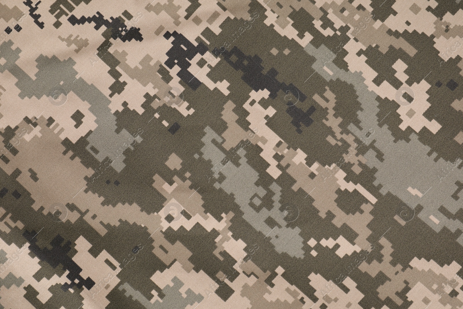 Photo of Texture of camouflage fabric as background, top view