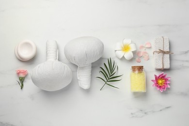 Photo of Flat lay composition with different spa products on white marble table