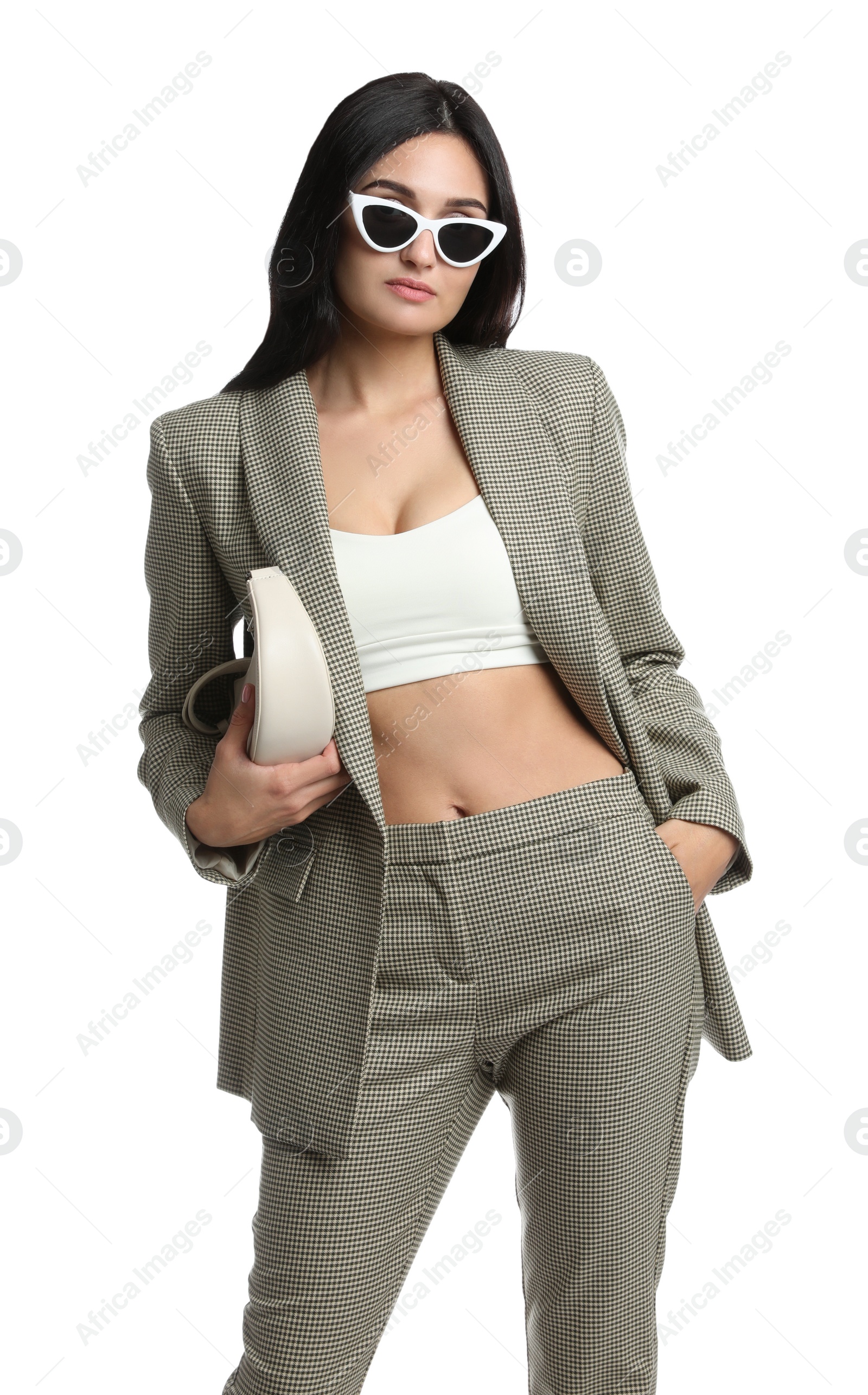 Photo of Beautiful woman with sunglasses and bag in formal suit on white background