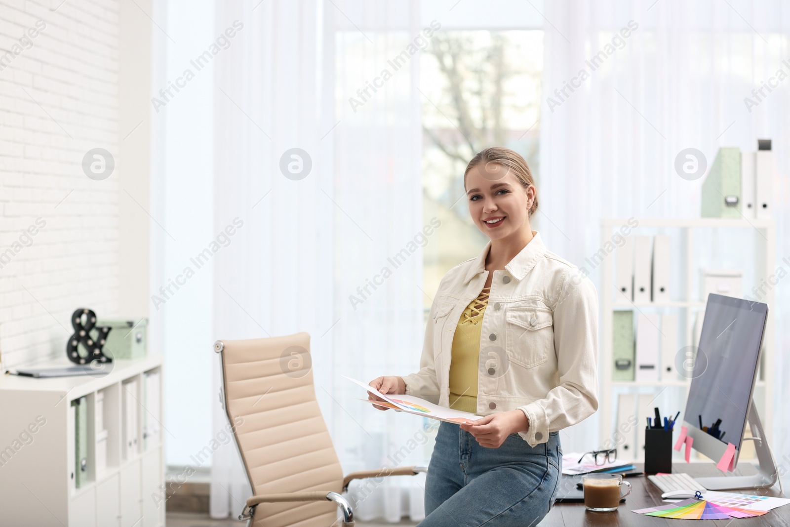 Photo of Portrait of female designer in office. Creative profession