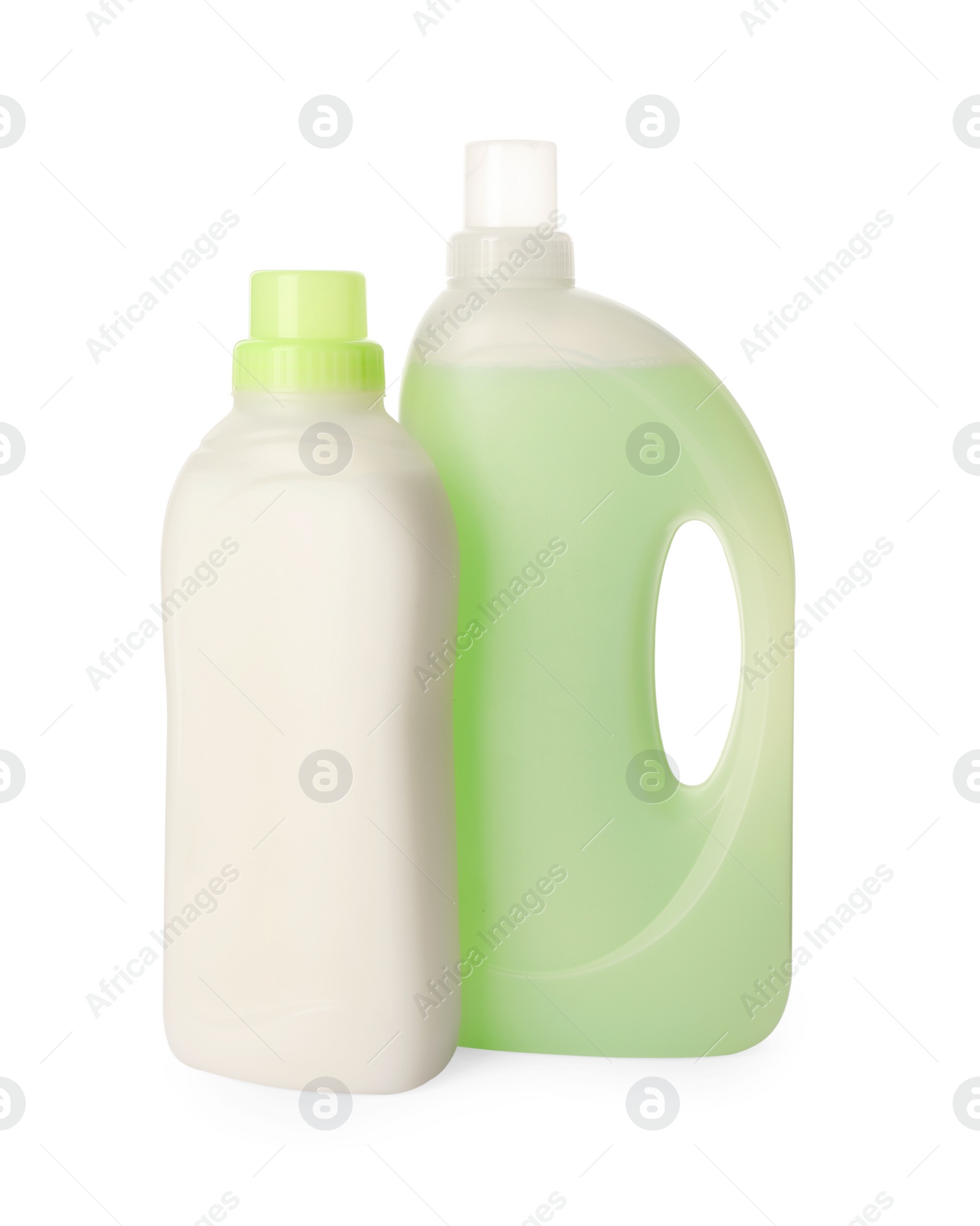 Photo of Bottles of fabric softener isolated on white