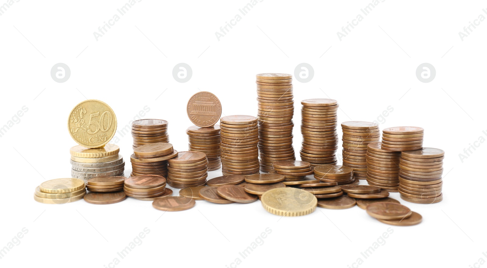 Photo of Many different stacked coins isolated on white