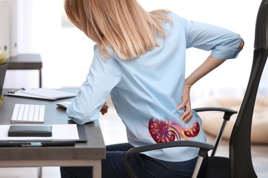 Image of Woman suffering from kidney pain in office