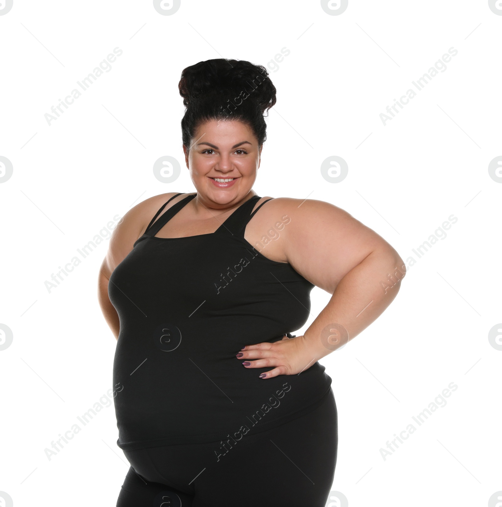 Photo of Happy overweight woman posing on white background