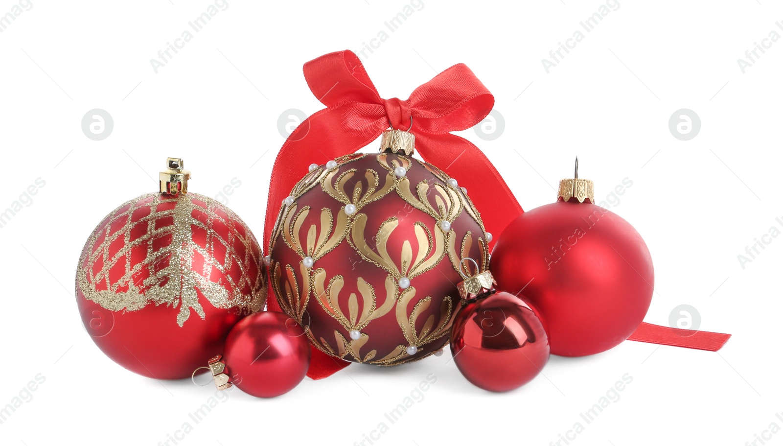 Photo of Set of beautiful red Christmas balls on white background