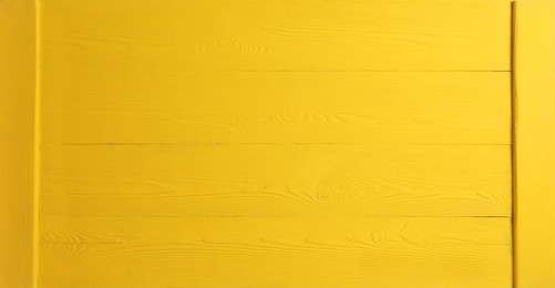 Image of Texture of yellow wooden surface as background, banner design