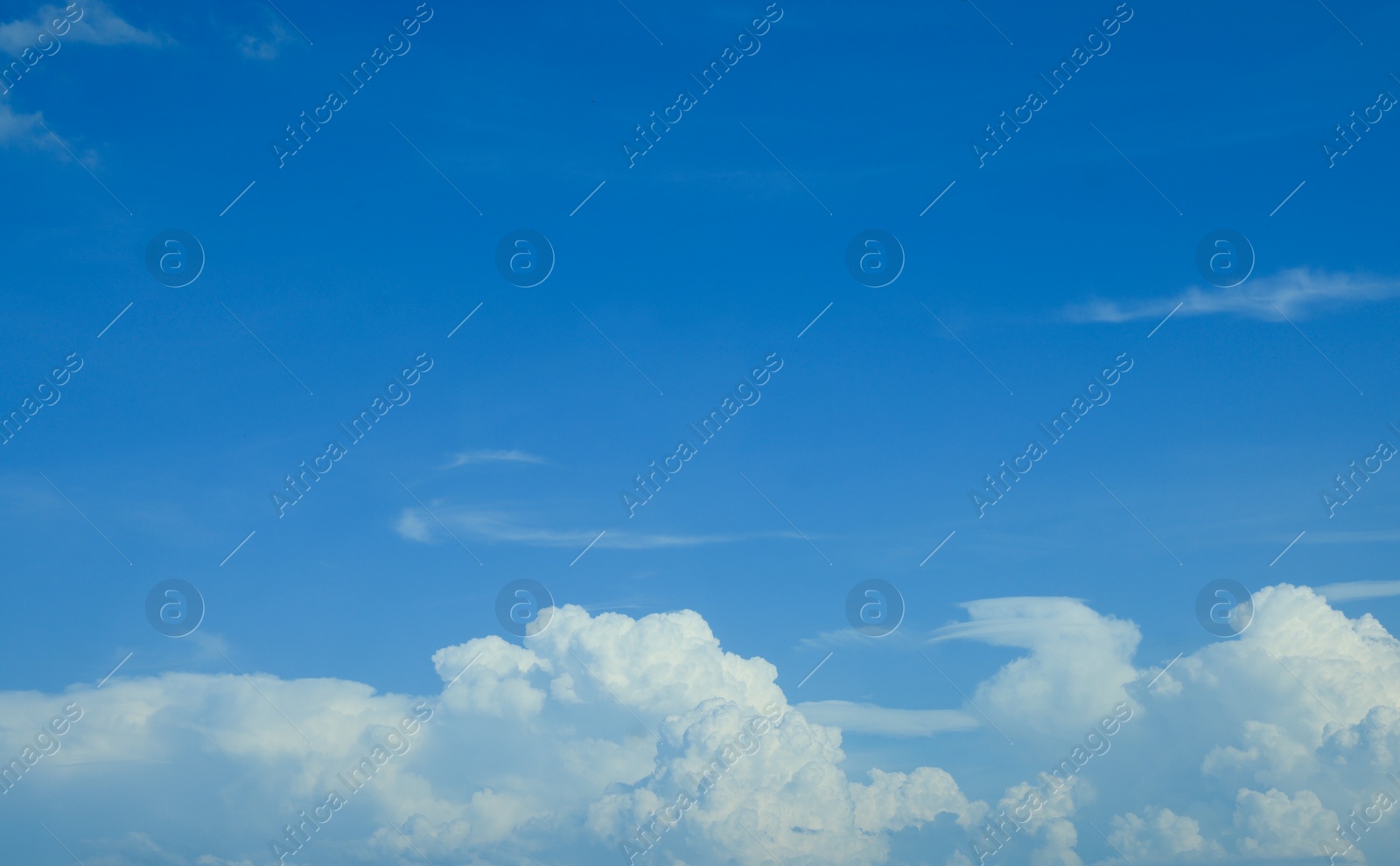 Photo of Beautiful blue sky with fluffy white clouds