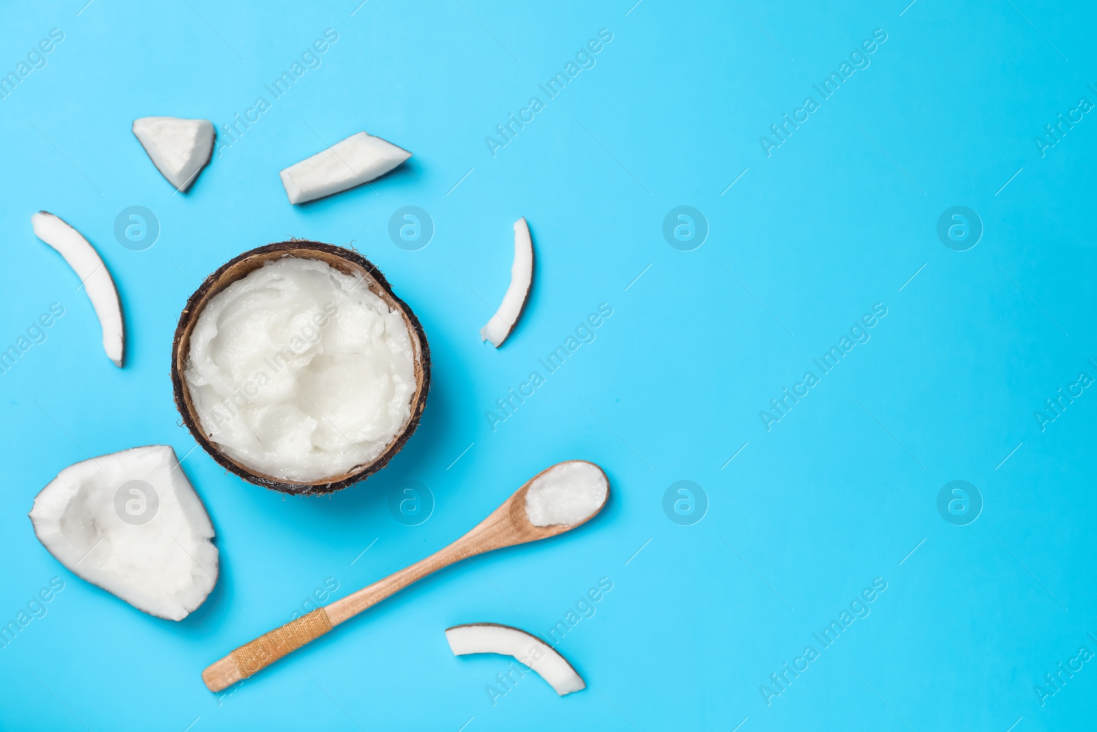 Photo of Flat lay composition with coconut oil on color background. Healthy cooking