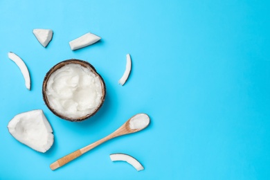 Photo of Flat lay composition with coconut oil on color background. Healthy cooking