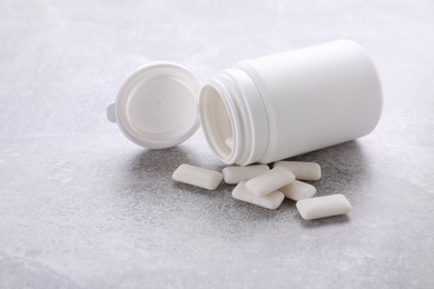 Photo of Jar with chewing gums on light table