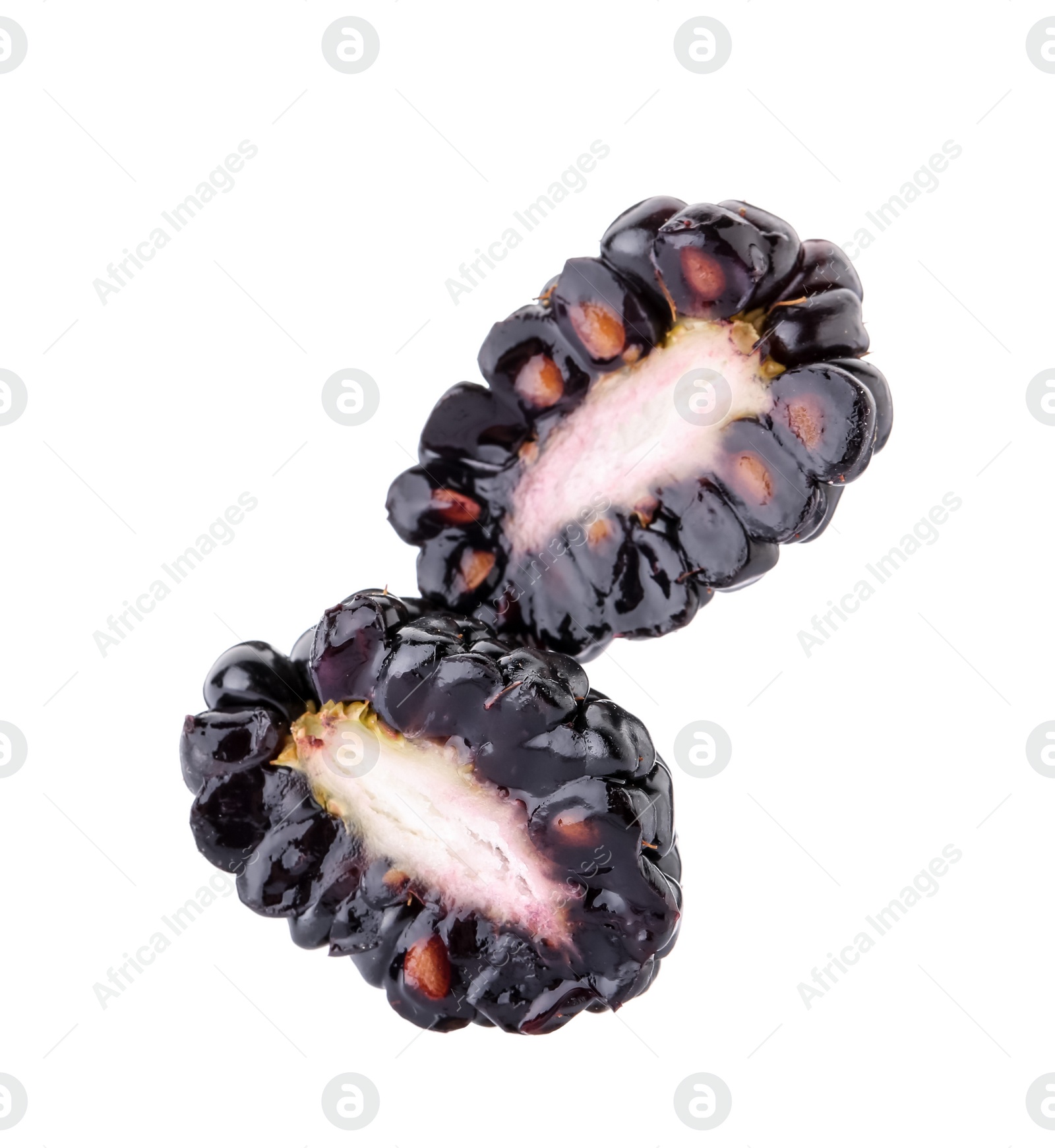Photo of Halves of tasty ripe blackberry on white background